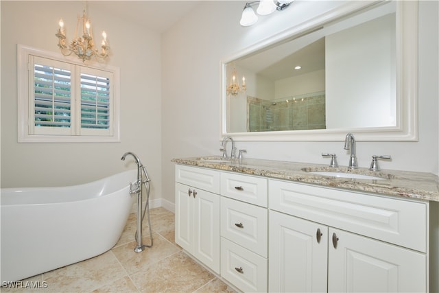 bathroom featuring vanity, independent shower and bath, an inviting chandelier, and tile patterned flooring