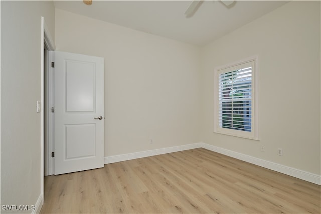 unfurnished room with light hardwood / wood-style floors and ceiling fan