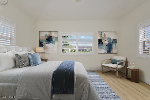 bedroom featuring light hardwood / wood-style floors