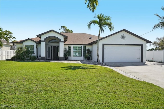 single story home with an attached garage, fence, driveway, stucco siding, and a front lawn