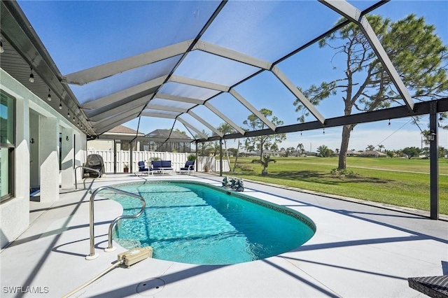 view of pool with a fenced in pool, a patio, a lanai, a yard, and outdoor lounge area