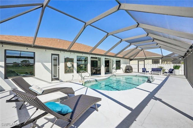 view of swimming pool featuring fence, outdoor lounge area, a fenced in pool, and a patio