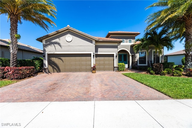 view of front of property featuring a garage