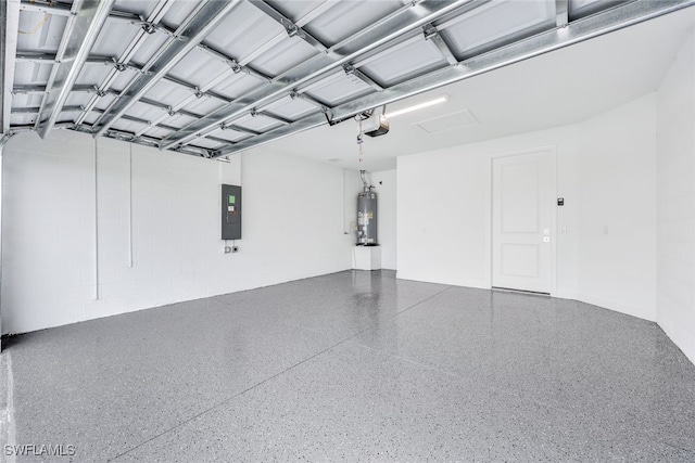 garage featuring a garage door opener, water heater, and electric panel