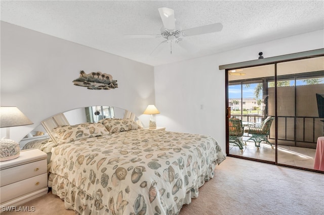 bedroom featuring ceiling fan, access to exterior, a textured ceiling, and light carpet