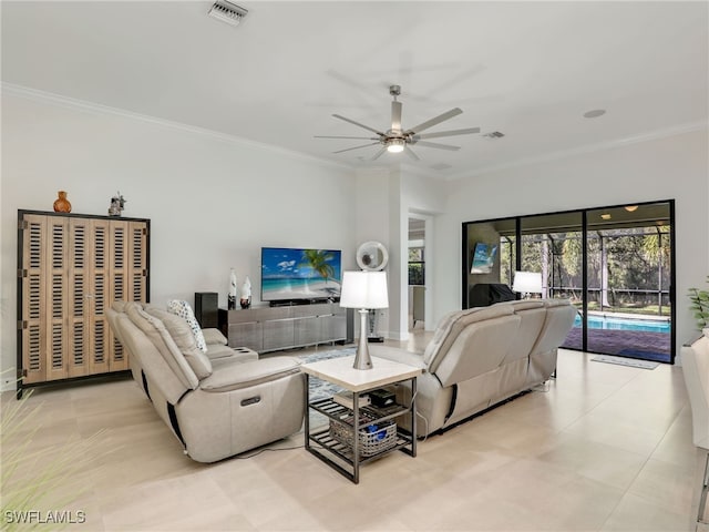 living room featuring crown molding and ceiling fan