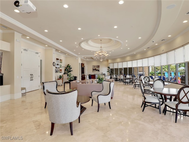 dining space with a chandelier, a raised ceiling, and ornamental molding