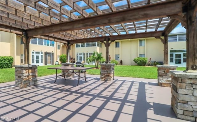 view of patio featuring a pergola and a grill