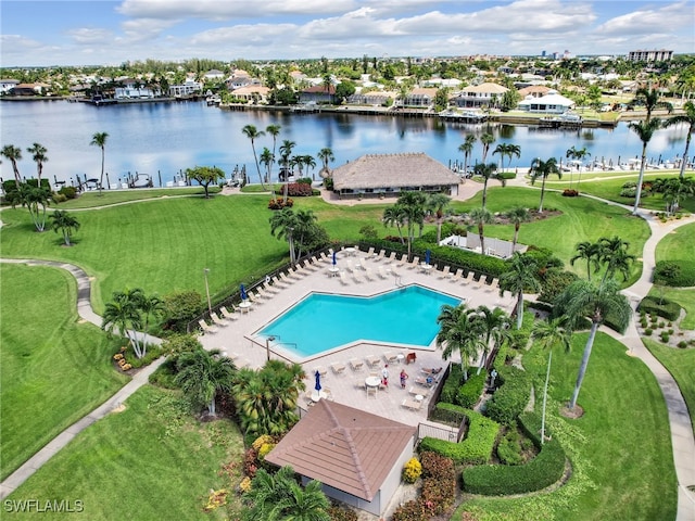 birds eye view of property featuring a water view