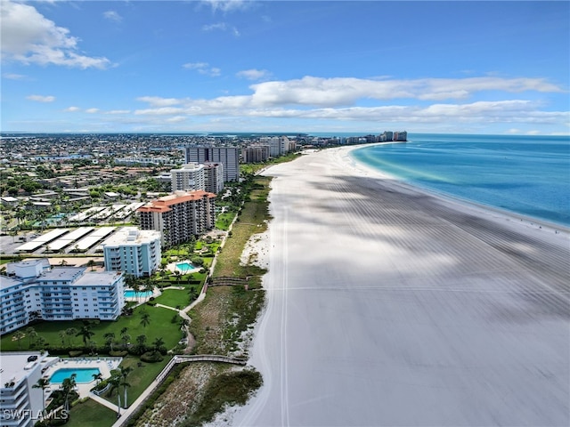 drone / aerial view with a view of the beach and a water view