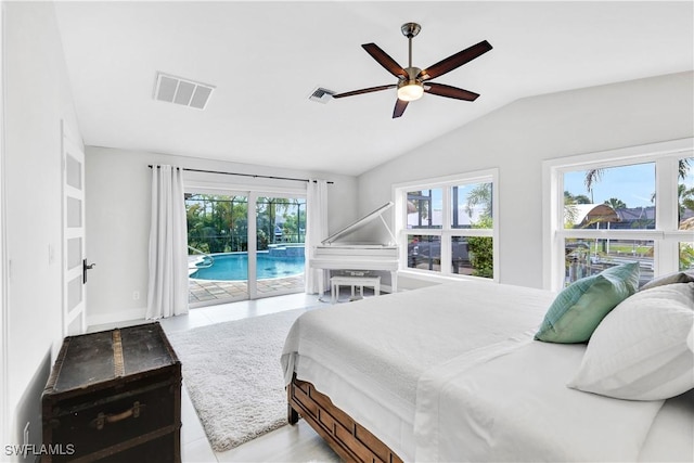 bedroom featuring access to outside, visible vents, vaulted ceiling, and a ceiling fan