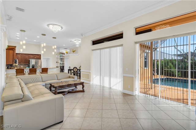 tiled living room featuring ornamental molding