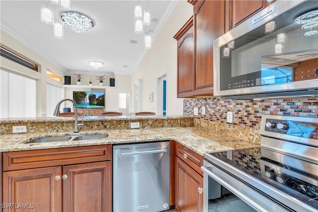 kitchen featuring stainless steel appliances, tasteful backsplash, sink, and crown molding