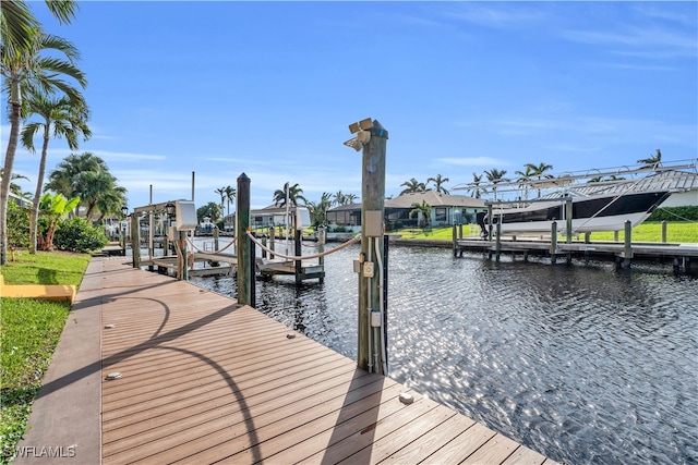 dock area with a water view