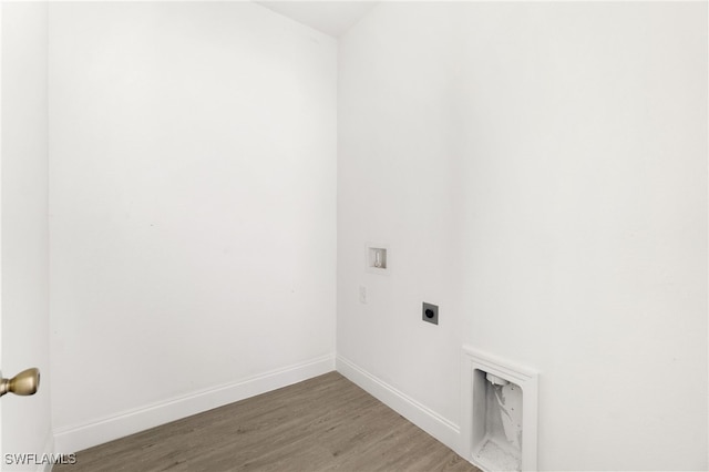 laundry room with washer hookup, electric dryer hookup, and hardwood / wood-style floors