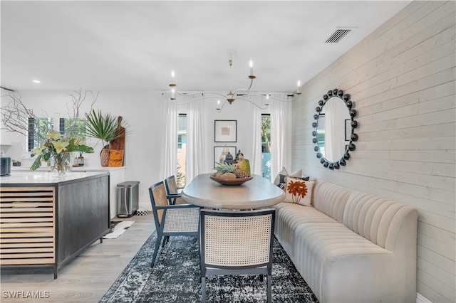 dining room with light hardwood / wood-style flooring