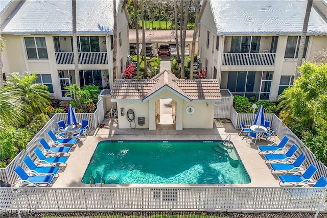 view of swimming pool with a patio