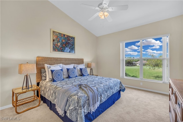 bedroom with carpet, lofted ceiling, and ceiling fan