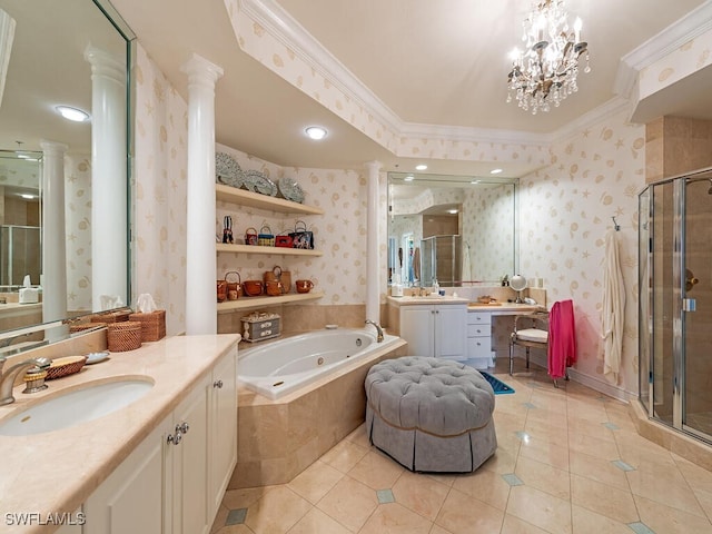 bathroom with vanity, a notable chandelier, shower with separate bathtub, crown molding, and ornate columns