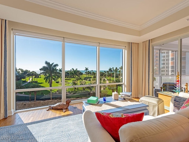 4201 Gulf Shore Blvd N Unit 402, Naples, FL 34103 - sunroom / solarium with crown molding, hardwood / wood-style flooring, and healthy amount of natural light