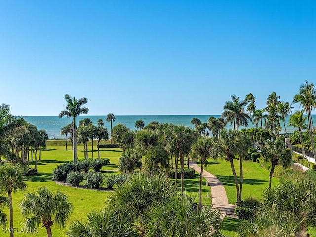 4201 Gulf Shore Blvd N Unit 402, Naples, FL 34103 - view of community with a water view and a lawn