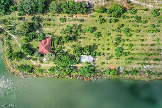 bird's eye view with a rural view and a water view