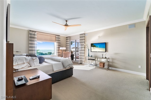 bedroom with carpet, ceiling fan, and ornamental molding