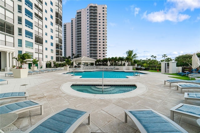 view of swimming pool featuring a patio