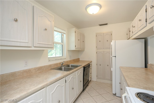 kitchen with white cabinets, light tile patterned floors, sink, dishwasher, and white stove