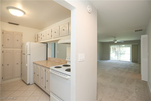 kitchen featuring light carpet, white appliances, ceiling fan, and extractor fan