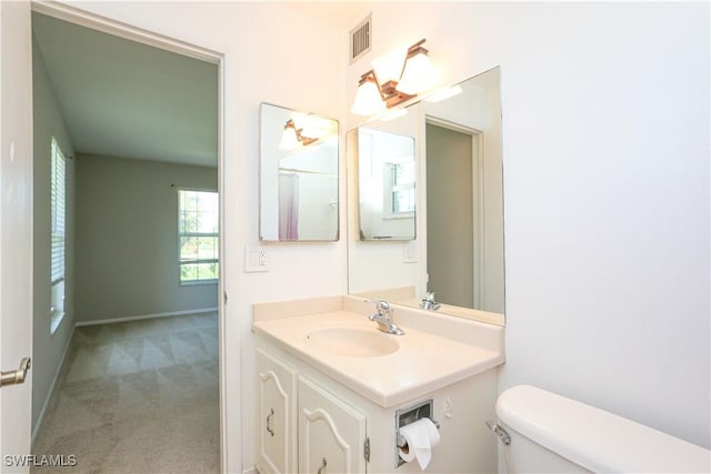 221 Cypress Way E Unit 201, Naples, FL 34110 - bathroom with toilet and vanity