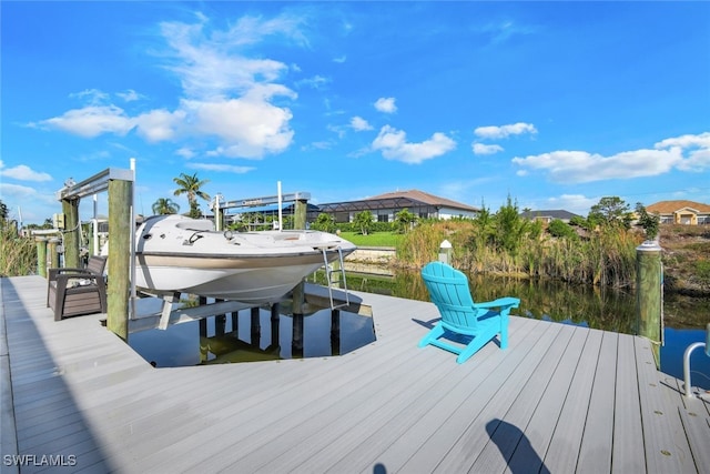 view of dock with a water view