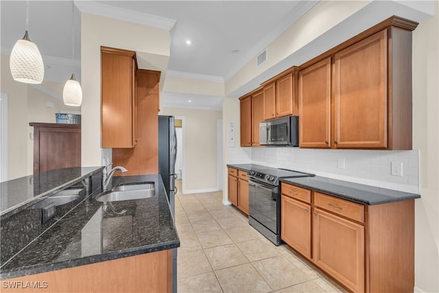 kitchen featuring pendant lighting, black electric range oven, sink, fridge, and dark stone countertops