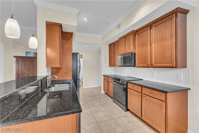 kitchen with dark stone counters, sink, stainless steel appliances, decorative light fixtures, and crown molding