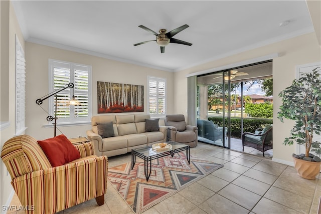 tiled living room featuring ceiling fan, crown molding, and a healthy amount of sunlight