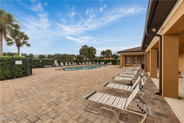 view of pool featuring a patio