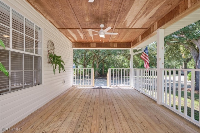 wooden deck with ceiling fan