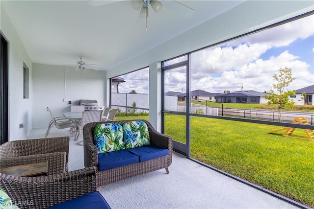 sunroom / solarium with ceiling fan