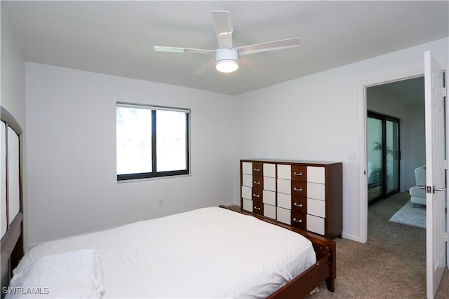 bedroom featuring ceiling fan and carpet floors