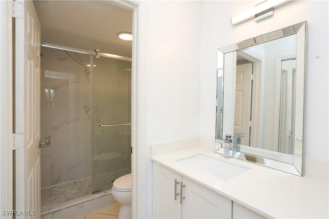5754 Deauville Cir Unit E104, Naples, FL 34112 - full bathroom featuring toilet, a marble finish shower, vanity, and tile patterned flooring