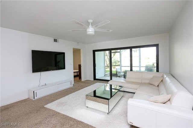 5754 Deauville Cir Unit E104, Naples, FL 34112 - carpeted living area with a ceiling fan