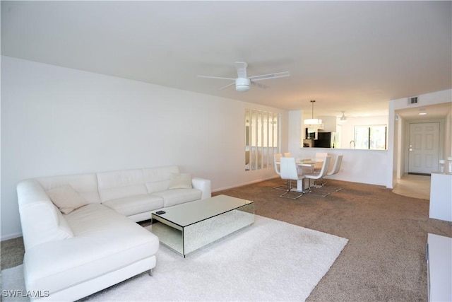 5754 Deauville Cir Unit E104, Naples, FL 34112 - carpeted living area with ceiling fan
