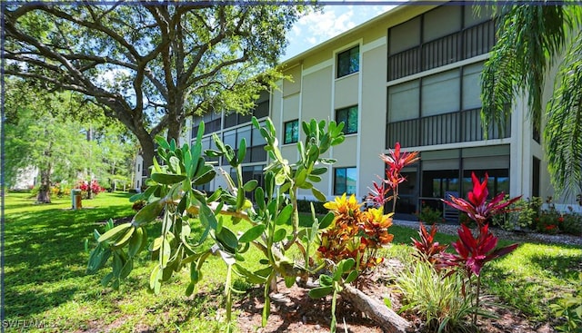 5754 Deauville Cir Unit E104, Naples, FL 34112 - surrounding community featuring a yard