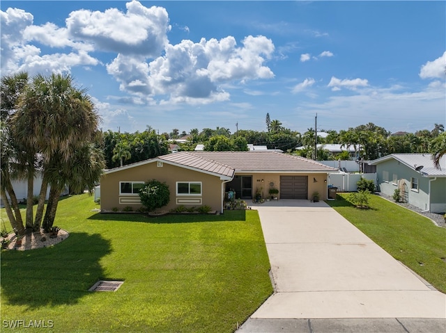 ranch-style house with a front lawn and a garage