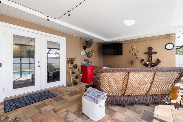 living room with french doors and a wealth of natural light