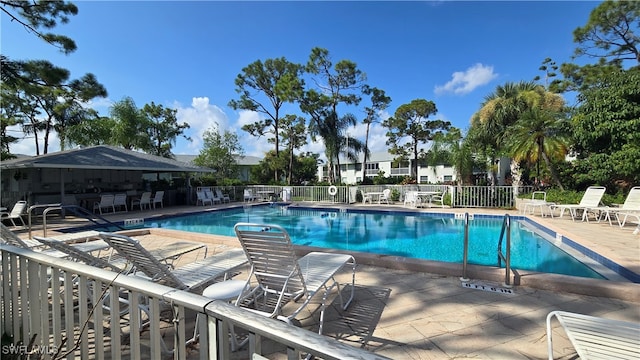 view of pool featuring a patio