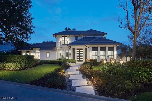 803 Shadow Lake Ln, Naples, FL 34108 - prairie-style home featuring french doors and stucco siding