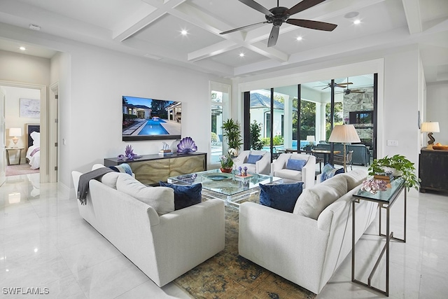 living room with beamed ceiling, ceiling fan, and coffered ceiling