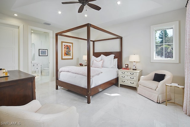 bedroom with ceiling fan and ensuite bath