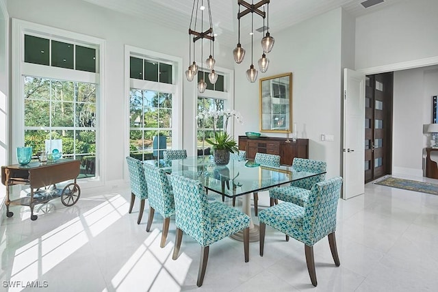 803 Shadow Lake Ln, Naples, FL 34108 - tiled dining area featuring baseboards